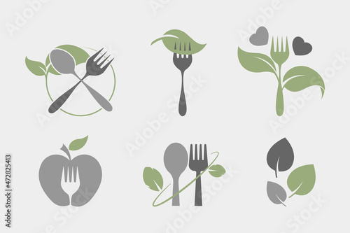 Natural plant based vegetarian food icon set. Spoon, fork and leaves illustration. Flat style. Isolated on white background. 
