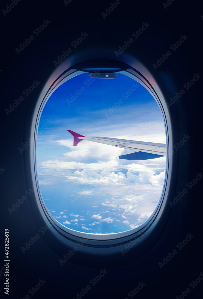 Clouds sky, looking through the window of an airplane. Clouds sky, looking through the window of an airplane.