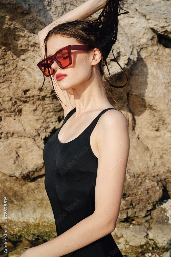 woman in a swimsuit sunglasses summer tan exotic travel woman in a swimsuit sunglasses summer tan exotic travel