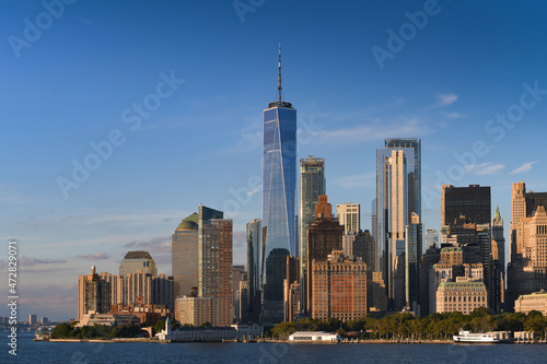Skyline of Manhattan with its tall skyscraper buildings before sunrise. Visit New York, travel to America. One of the best places to see.
