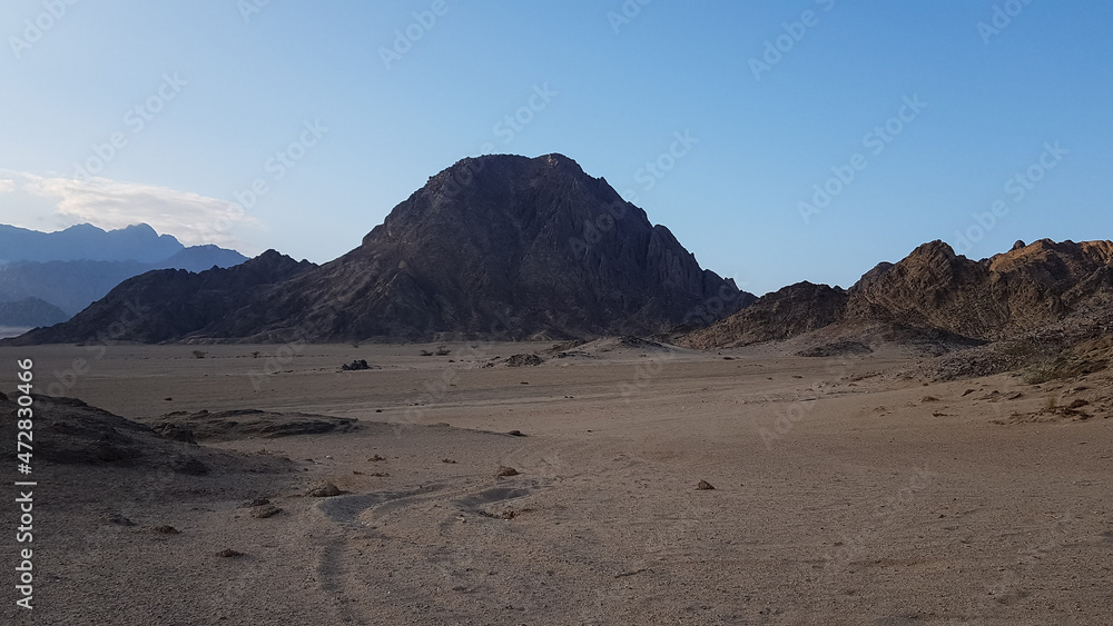 the image of the mountains on the Sinai Peninsula at sunset. the desert of Sharm el Sheikh in the evening. excursion in Egypt. travel. the image of the mountains on the Sinai Peninsula at sunset. the desert of Sharm el Sheikh in the evening. excursion in Egypt. travel.