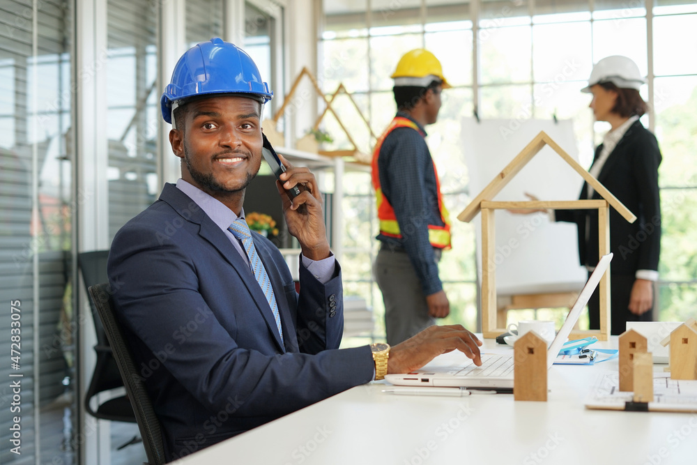 portrait african american engineer confident business project manager using smartphone to communicate business in the meeting room.backgound blurred dicuss teamwork portrait african american engineer confident business project manager using smartphone to communicate business in the meeting room.backgound blurred dicuss teamwork
