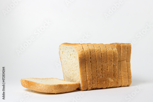 Sliced toast bread on a white plate. Bakery product