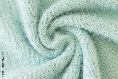 Swirl of wool fabric swatch or mohair woolen texture photo