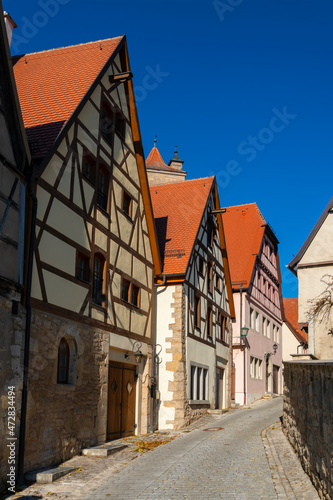 Rothenburg ob der Tauber is a picturesque city in Franconia Bavaria Germany near Würzburg. The old town with renovated truss houses and half timbering is a major international tourist attraction. 