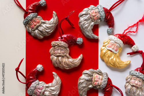 grungy santa face christmas ornaments on paper