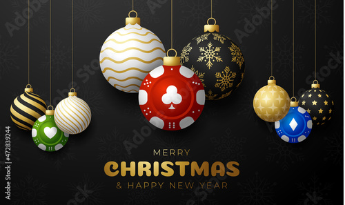 Casino Poker Christmas card. Merry Christmas sport greeting card. Hang on a thread casino poker chip as a xmas ball and golden bauble on black background