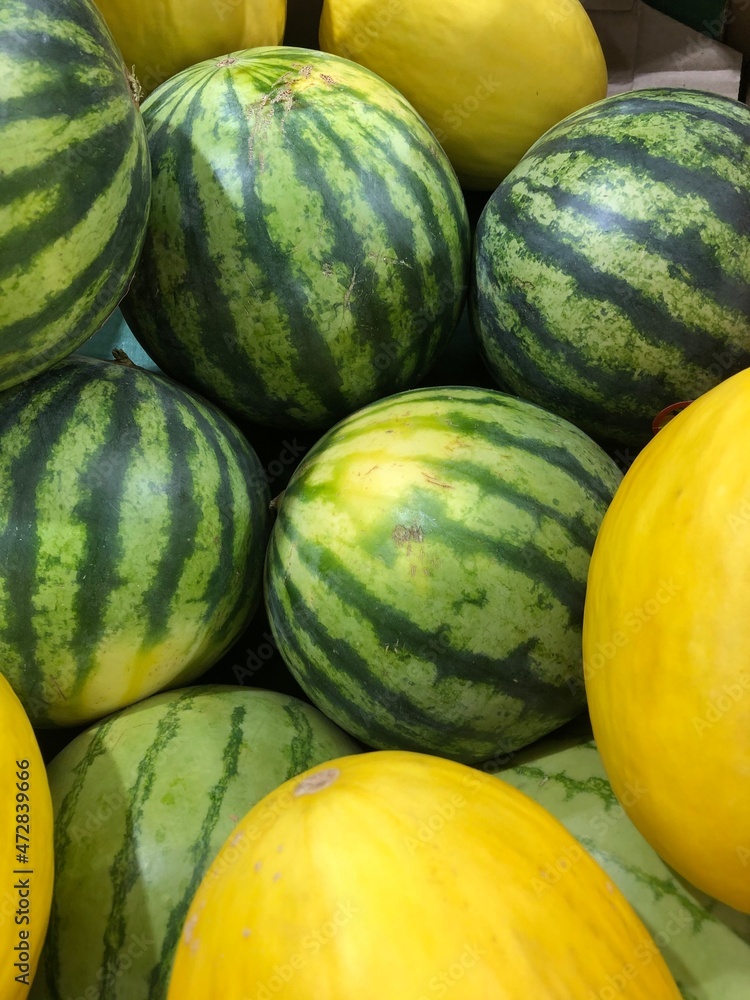 melons in a market melons in a market