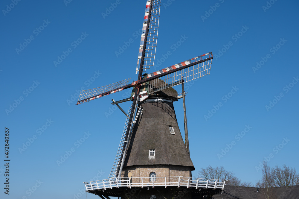 Old Dutch grain wind mill in Veldhoven, North Brabant, Netherlands