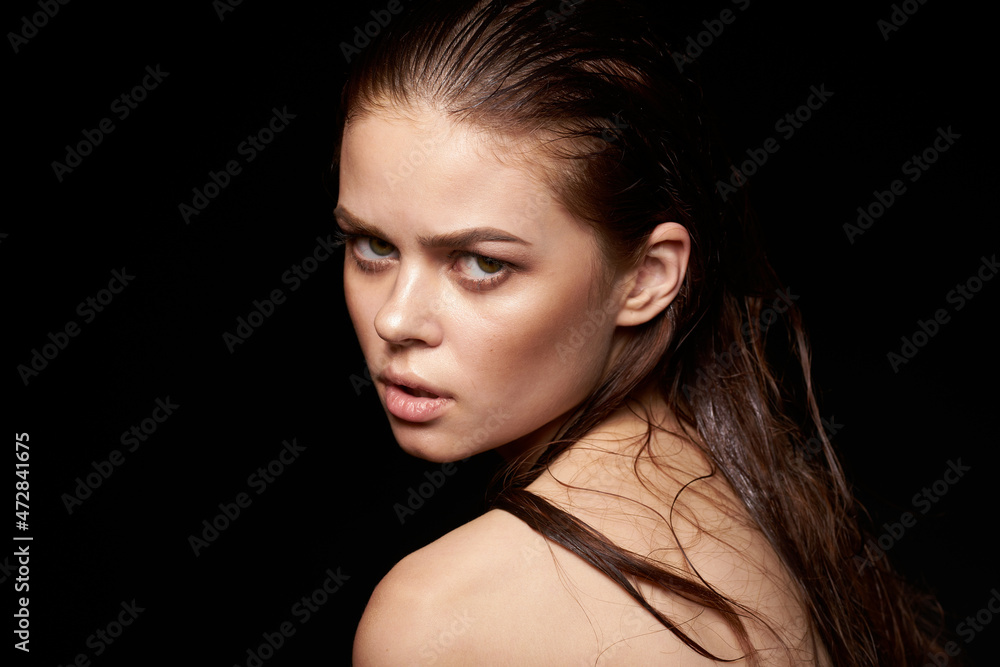woman model bare shoulders clean skin wet hair dark background woman model bare shoulders clean skin wet hair dark background