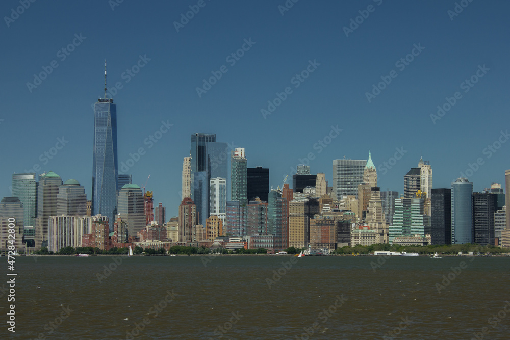 New Yorck City during the day with buildings and clear skies New Yorck City during the day with buildings and clear skies