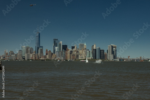 New Yorck City during the day with buildings and clear skies photo