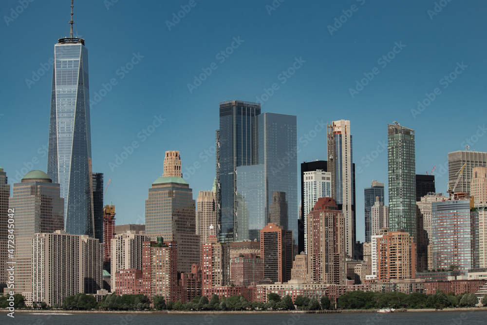 New York City street photo with buildings during clear day New York City street photo with buildings during clear day