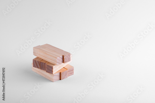 Blocks wooden bricks on a white background from the board game