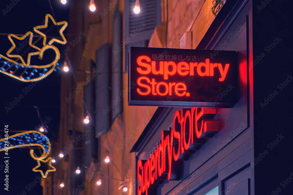 Superdry Store signboard logo at the facade entrance to store in downtown  Valletta: Valletta, Malta - December 3, 2021. Closeup of led sign board of  Superdry Store Stock Photo | Adobe Stock