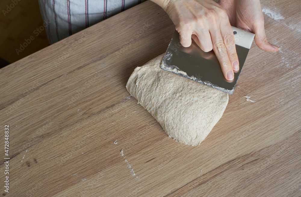 Kneading the dough for sourdough bread Kneading the dough for sourdough bread