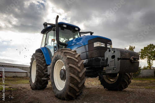 Big blue modern tractor.