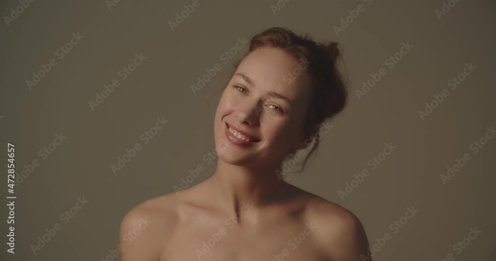 Beautiful Young Woman Looking Away And Touching Neck Beautiful Young Woman Looking Away And Touching Neck