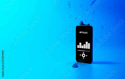 Music background. Mobile smartphone screen with music application, sound headphones. Audio voice with radio beats on blue gradient. Recording studio or podcasting banner with copy space.