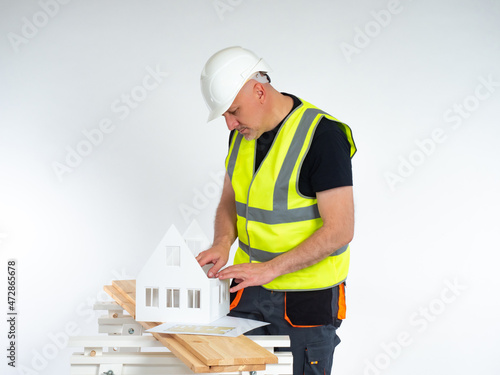 A man examines the drawing ...