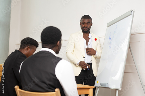 business training african successful men in the office