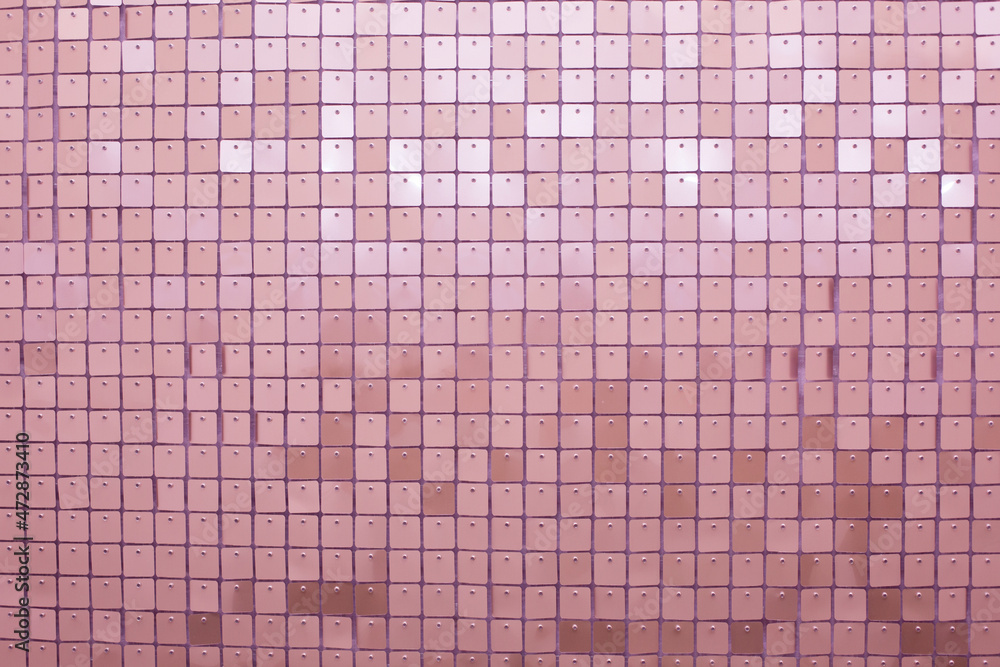 Fototapeta premium Pink glittering sequin background. Holiday decoration with sparkle sequin texture