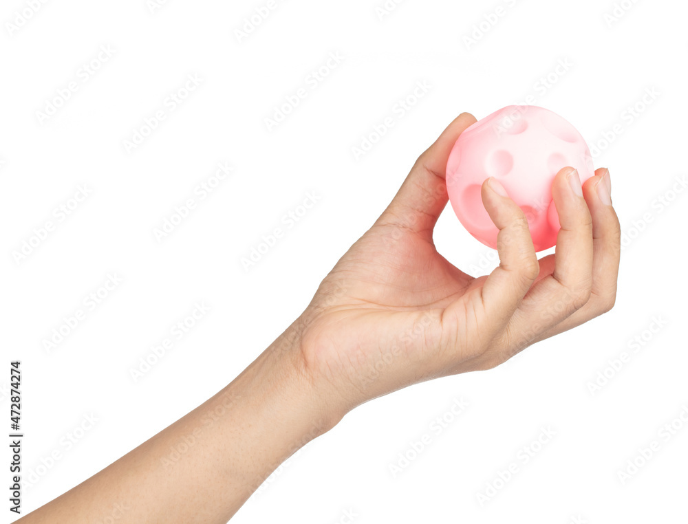 Hand holding Pink Rubber ball toy isolated on white background Hand holding Pink Rubber ball toy isolated on white background