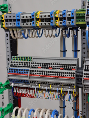 Multilevel electrical terminals with connected mounting flexible wires. © Нелик Дулатов