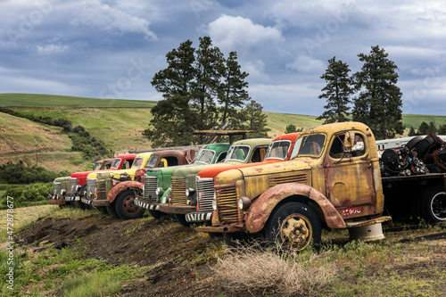 Row of colorful old trucks, Palouse region of eastern Washington. photo