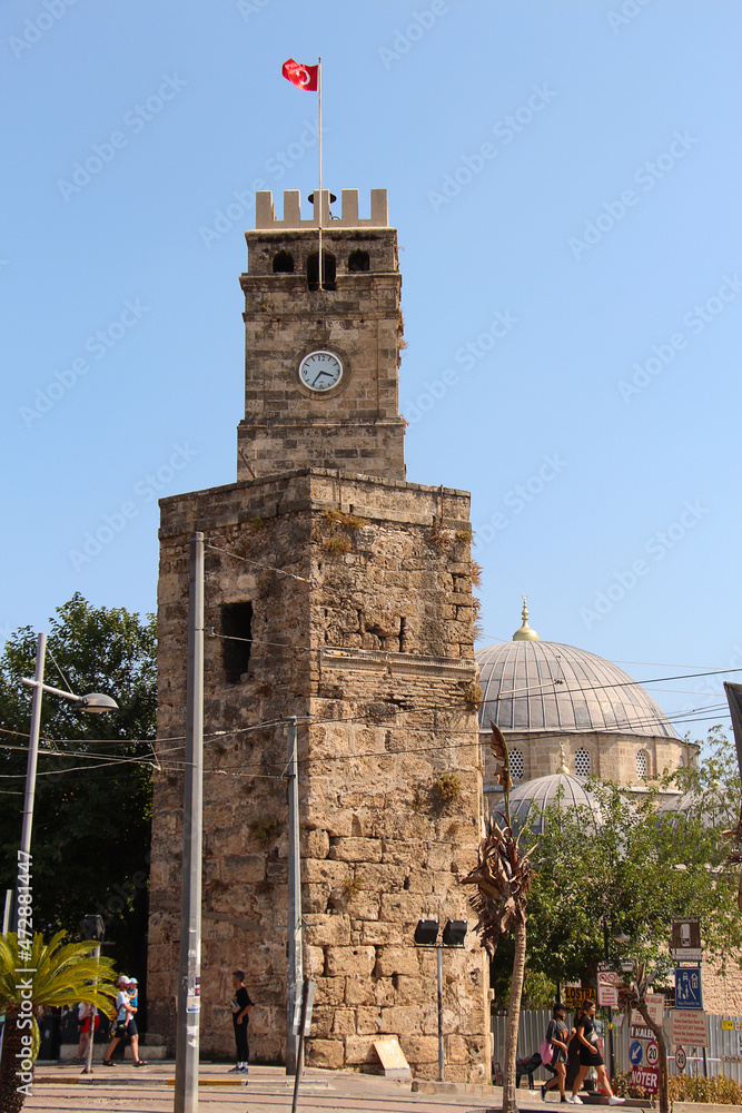 Antalya, Turkey - August 8, 2021 : Clock Tower in Old Town Kaleici, Antalya