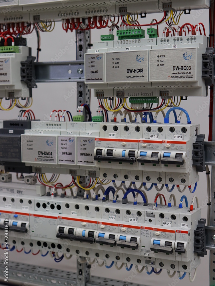Larnitech automation modules with connected colored mounting wires.3 ...