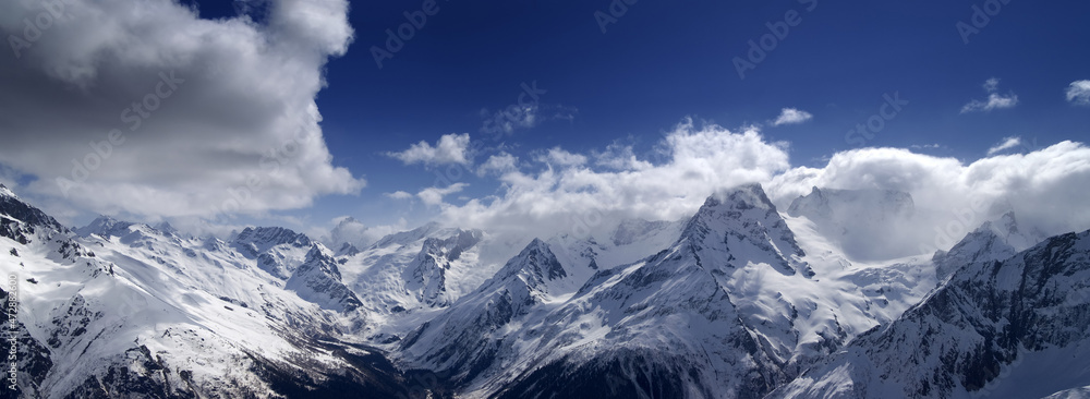 Mountains panorama in winter. View from the ski slope.