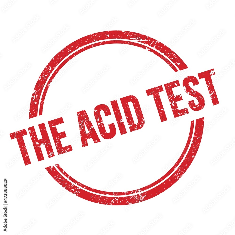 THE ACID TEST text written on red grungy round stamp. THE ACID TEST text written on red grungy round stamp.