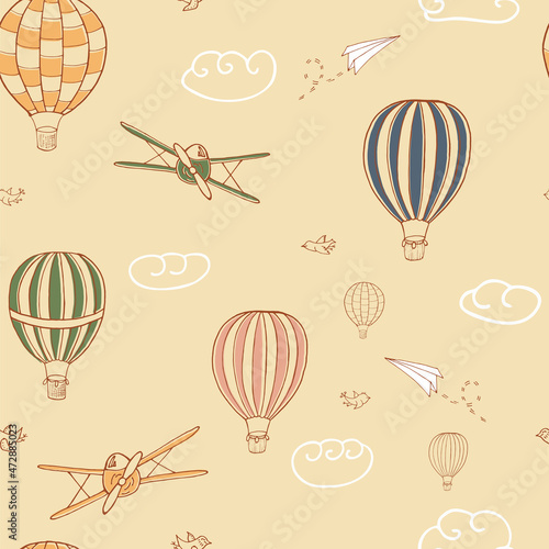 Colorful seamless vector pattern, hand drawn hot air baloons flying in the sky. Pattern for backgrounds, wrapping paper, fabrics and bed clothes