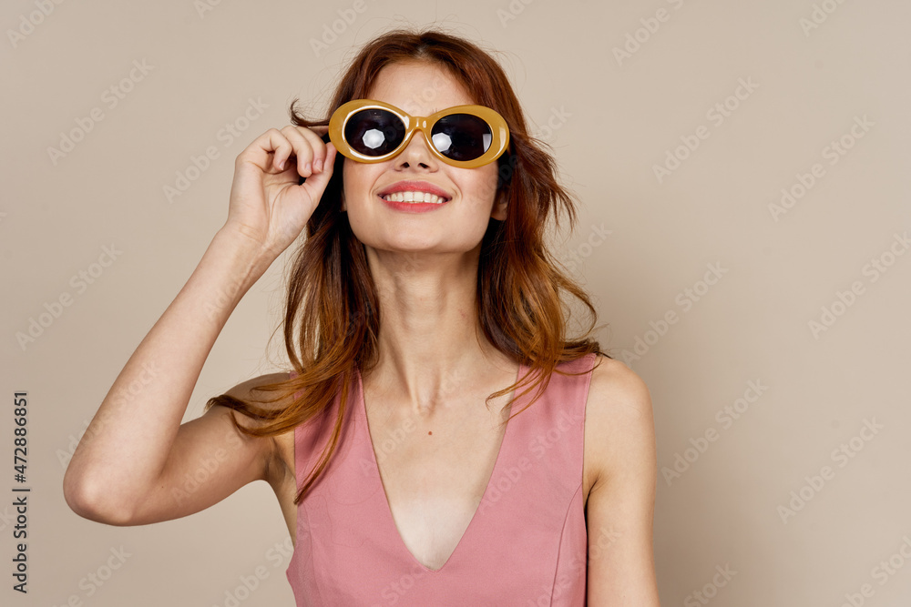 woman wearing sunglasses pink dress posing isolated background woman wearing sunglasses pink dress posing isolated background