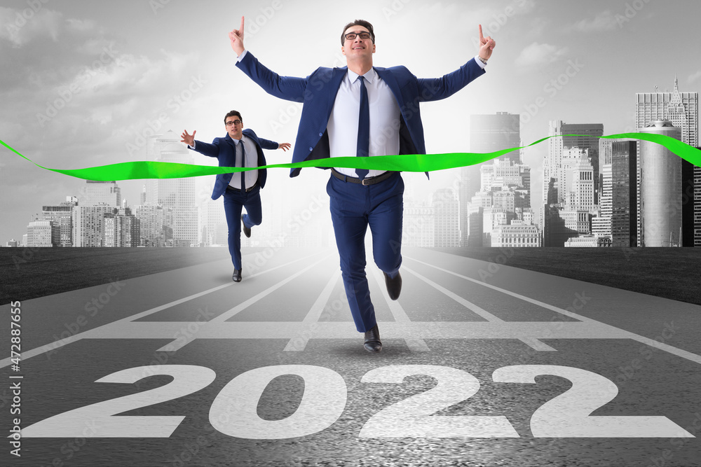 Businessman running to the 2022 year Businessman running to the 2022 year