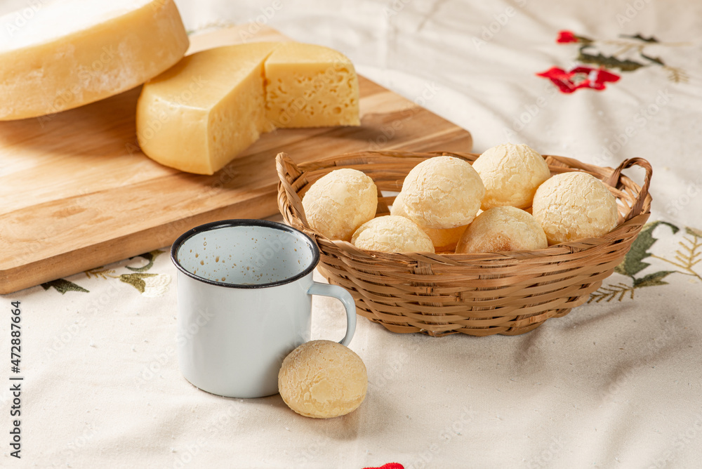 Cheese bread, breakfast table in Brazil, cheese bread, coffee and accessories, selective focus. Cheese bread, breakfast table in Brazil, cheese bread, coffee and accessories, selective focus.