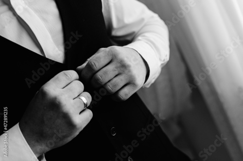 close up of a businessman holding their hands