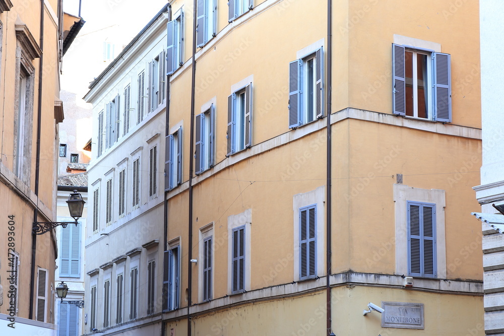 Traditional Building Facades with Windows with Shutters in Rome, Italy