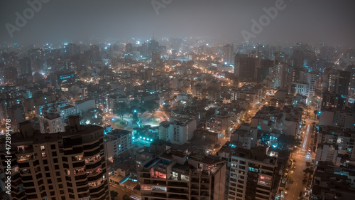 Panoramic aerial night view over Ovalo Bolognesi in Miraflores District from Lima, Peru
