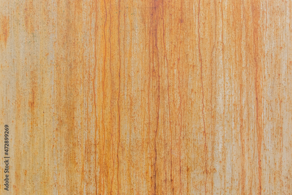 Naklejka premium Orange or yellow old rusty dirty metal surface with abstract worn iron pattern background texture