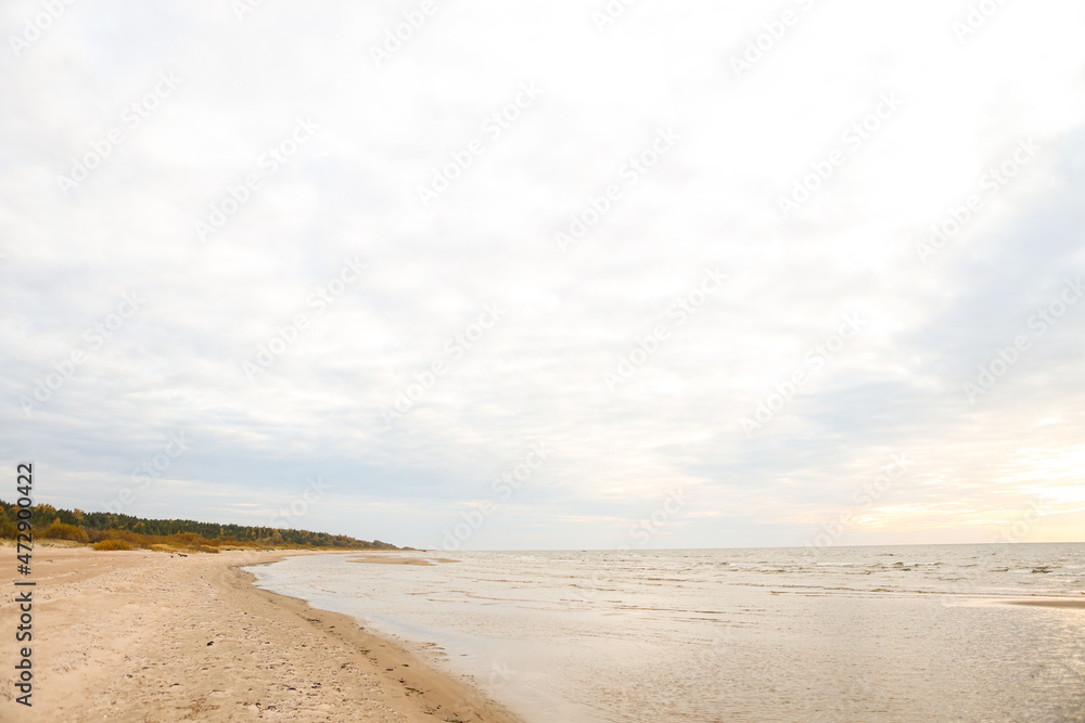 Beautiful seascape shore view with sand and Baltic sea.