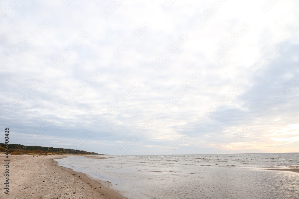 Beautiful seascape shore view with sand and Baltic sea.