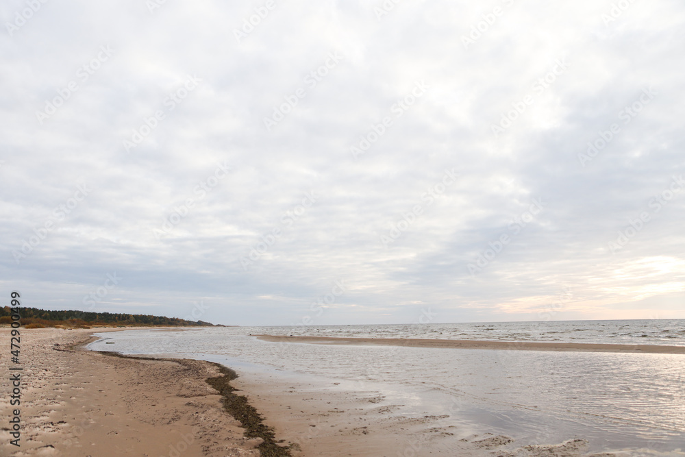 Beautiful seascape shore view with sand and Baltic sea.