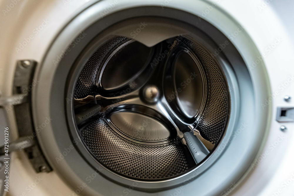 Open drum of the washing machine. Inside view. Open drum of the washing machine. Inside view.
