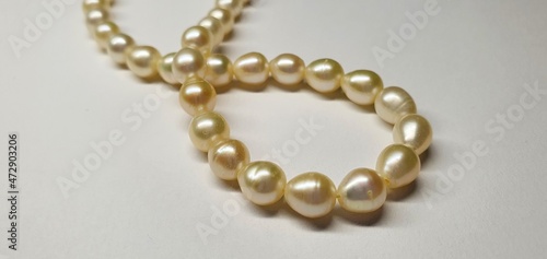 A beautiful necklace made of natural pearls. Pearl jewelry for women. Precious stones.