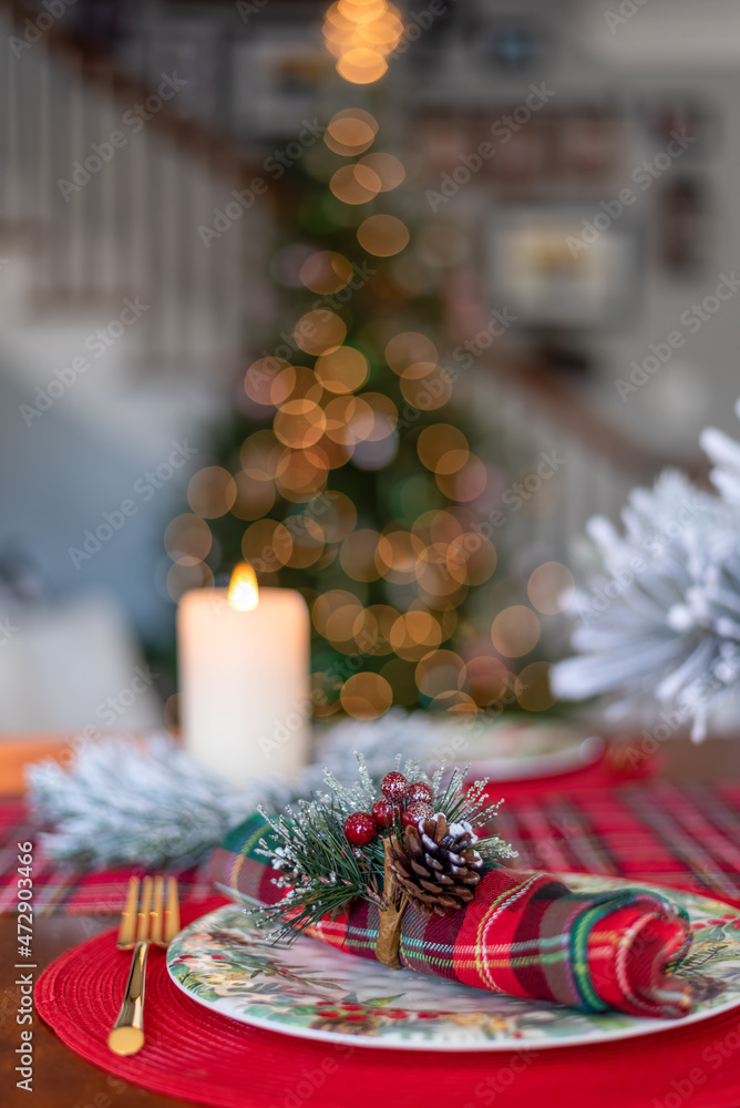 Closeup of festive holiday place setting in cozy home