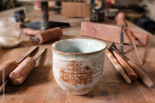 Shinoware Chawan ceramics pottery tea bowl with craftsman studio tools photo