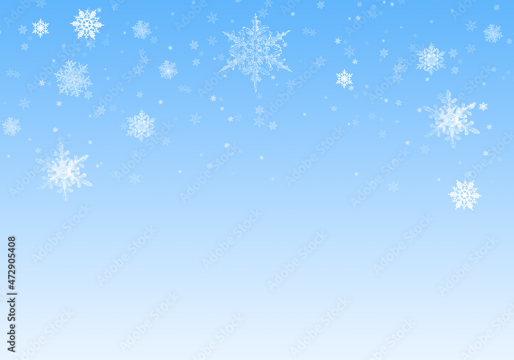Snow background. Blue Christmas snowfall with defocused flakes. Winter concept with falling snow. Holiday texture and white snowflakes.