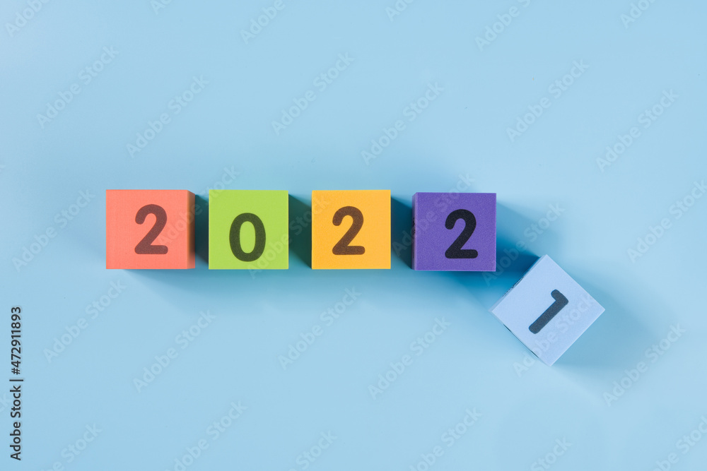 happy new year 2022 colorful cube on blue background happy new year 2022 colorful cube on blue background